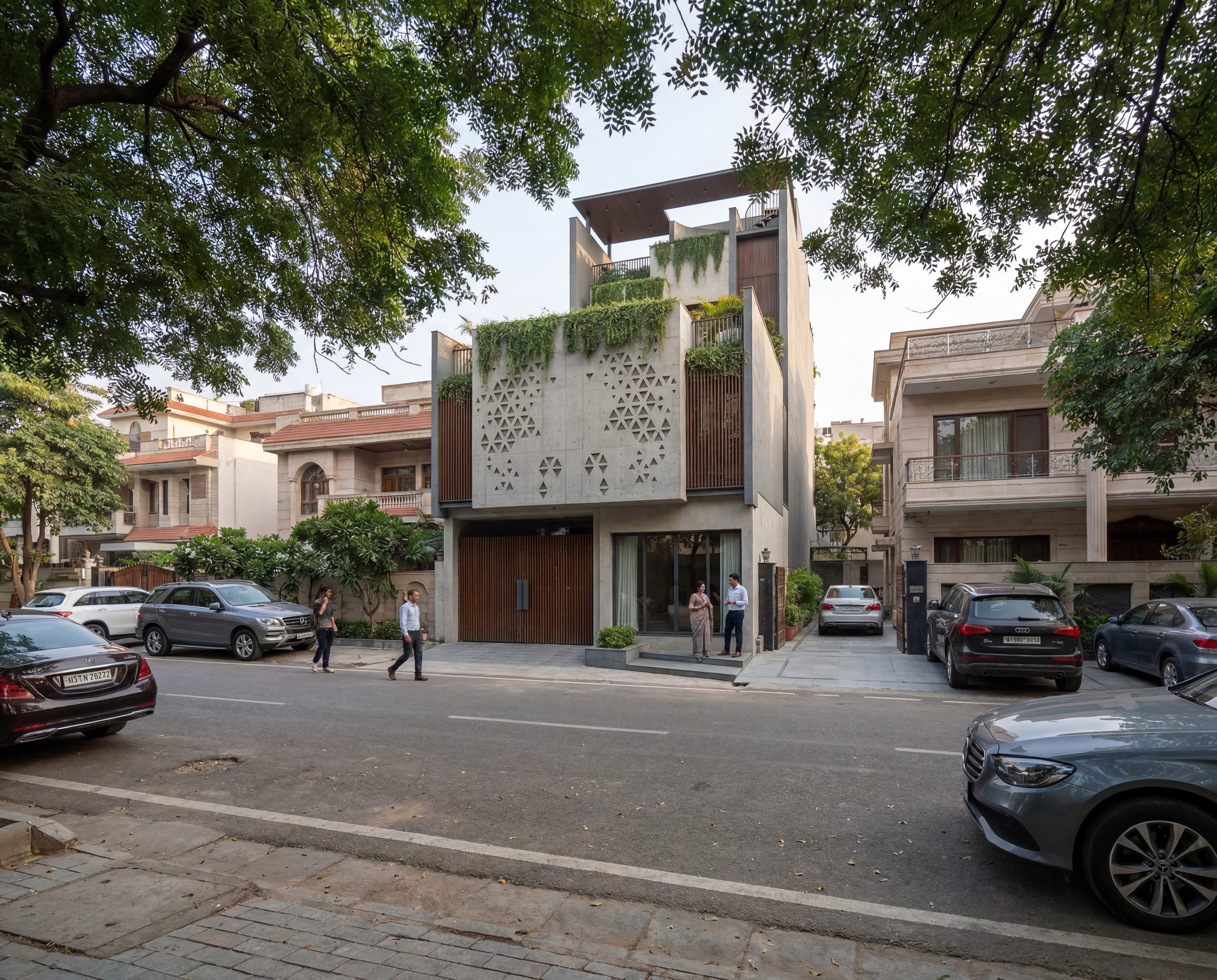A contemporary tropical residence in Ghaziabad that blends bold architectural massing with cascading greenery, creating a seamless connection between nature and modern living.